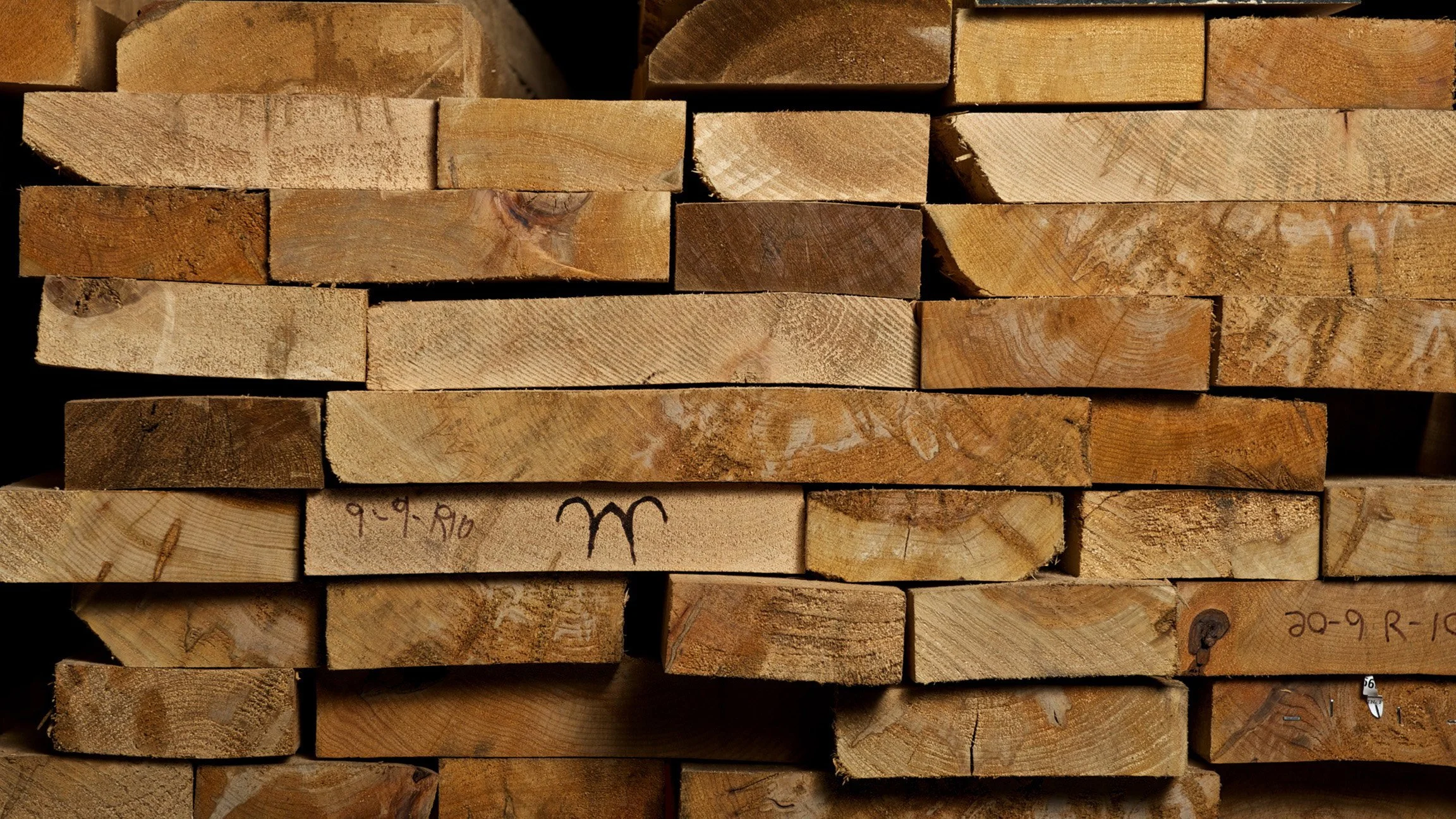 Stack of the end of dimensional lumber in the rack.