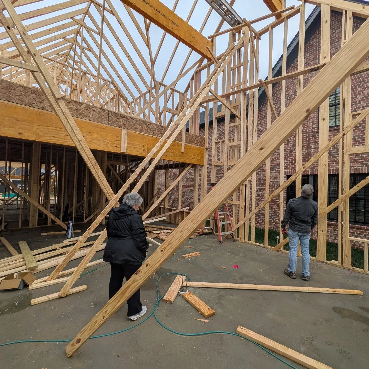 Clients getting the first glimpse of their new construction home starting to take shape!