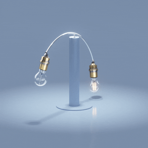 A lamp with two light bulbs hanging from curved wires attached to a vertical stand.