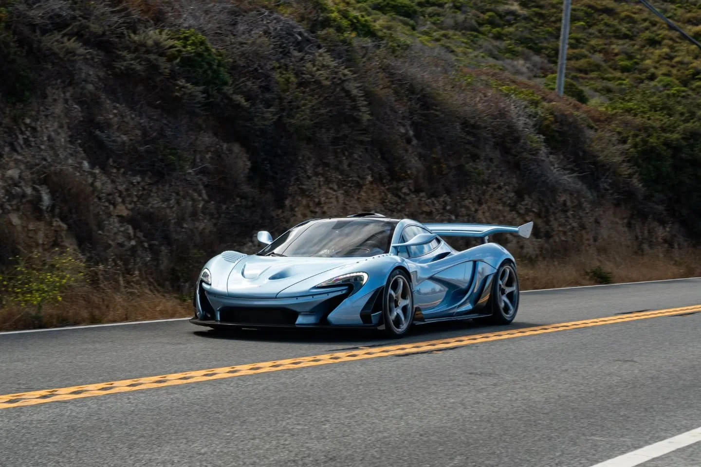 The McLaren P1 is part of the hypercar "Holy Trinity," a trio of halo cars that debuted in 2013 that also included the LaFerrari and the Porsche 918 Spyder. These cars redefined the perception of hybrid technology, taking advantage of elect
