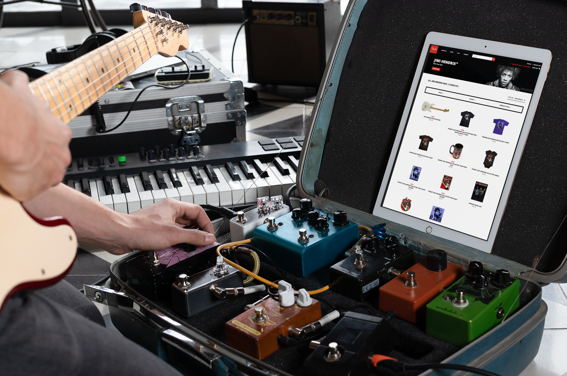 ipad-pro-mockup-of-a-man-playing-guitar-in-his-home-studio-25748.png