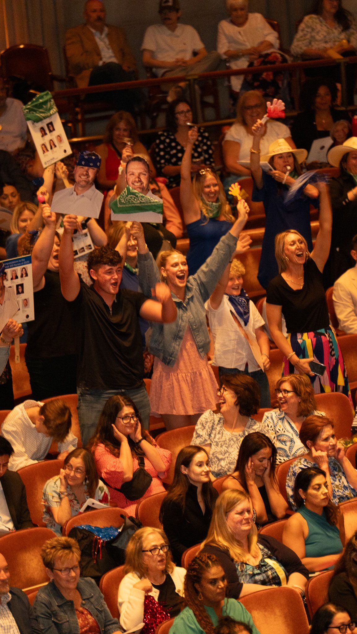 You could feel the pride from across the room. Surrounded by a sea of supporters, this honoree’s family cheered so loudly that some nearby had to cover their ears. They came prepared, holding up oversized photos and celebrating like it was a champion