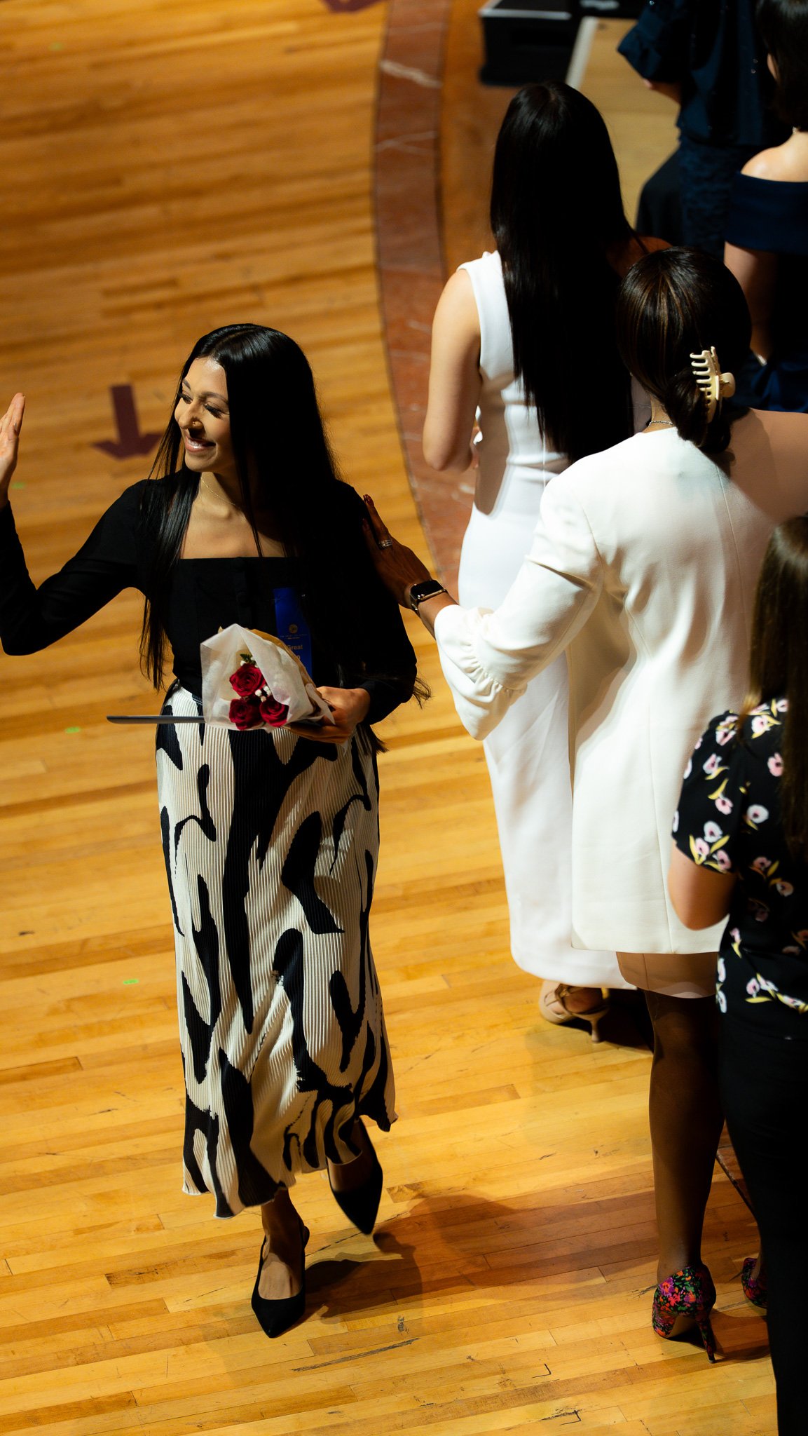 She walked across the stage with quiet grace, a heart full of gratitude, and a smile that said it all. In that moment, she wasn’t just being honored—she was taking it all in, fully present, and deeply moved by the journey that led her here.