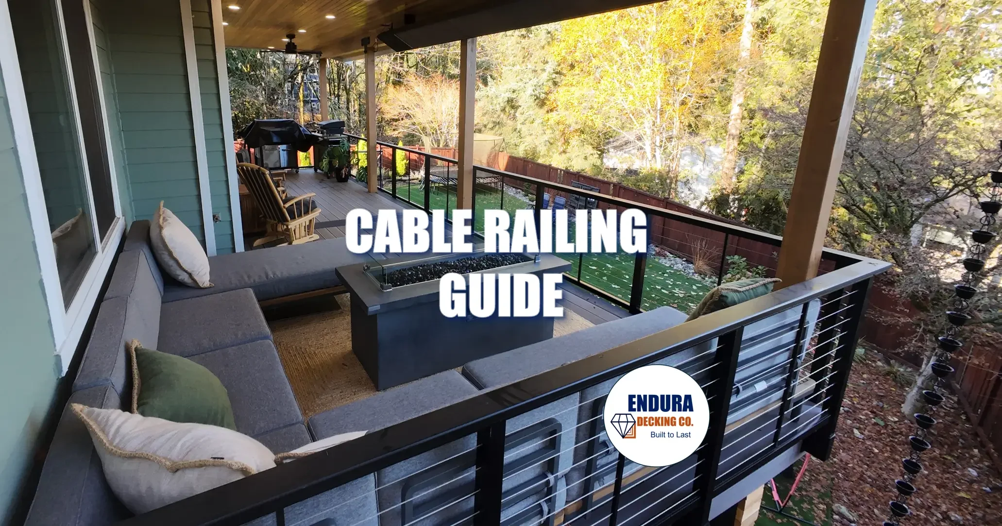 Modern cable railing with aluminum posts on a PNW deck overlooking trees