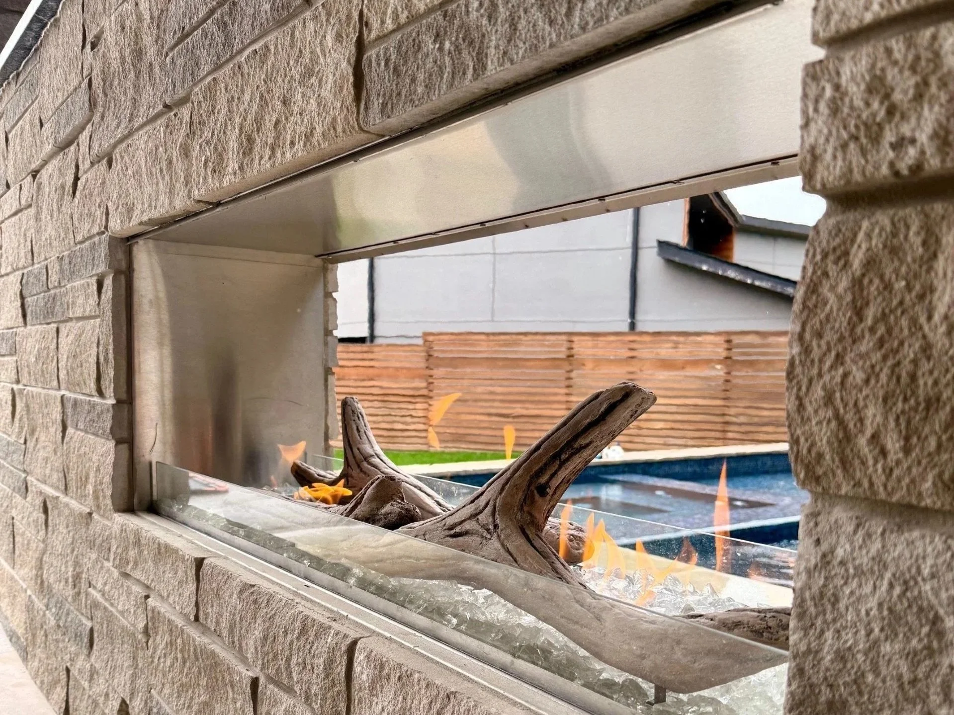 outdoor gas see through fireplace