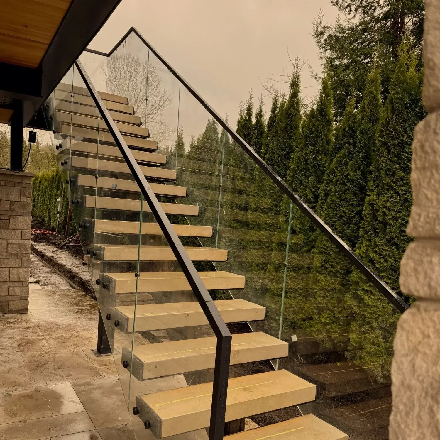 endura decking company outdoor living limestone treads metal stringer and glass railings