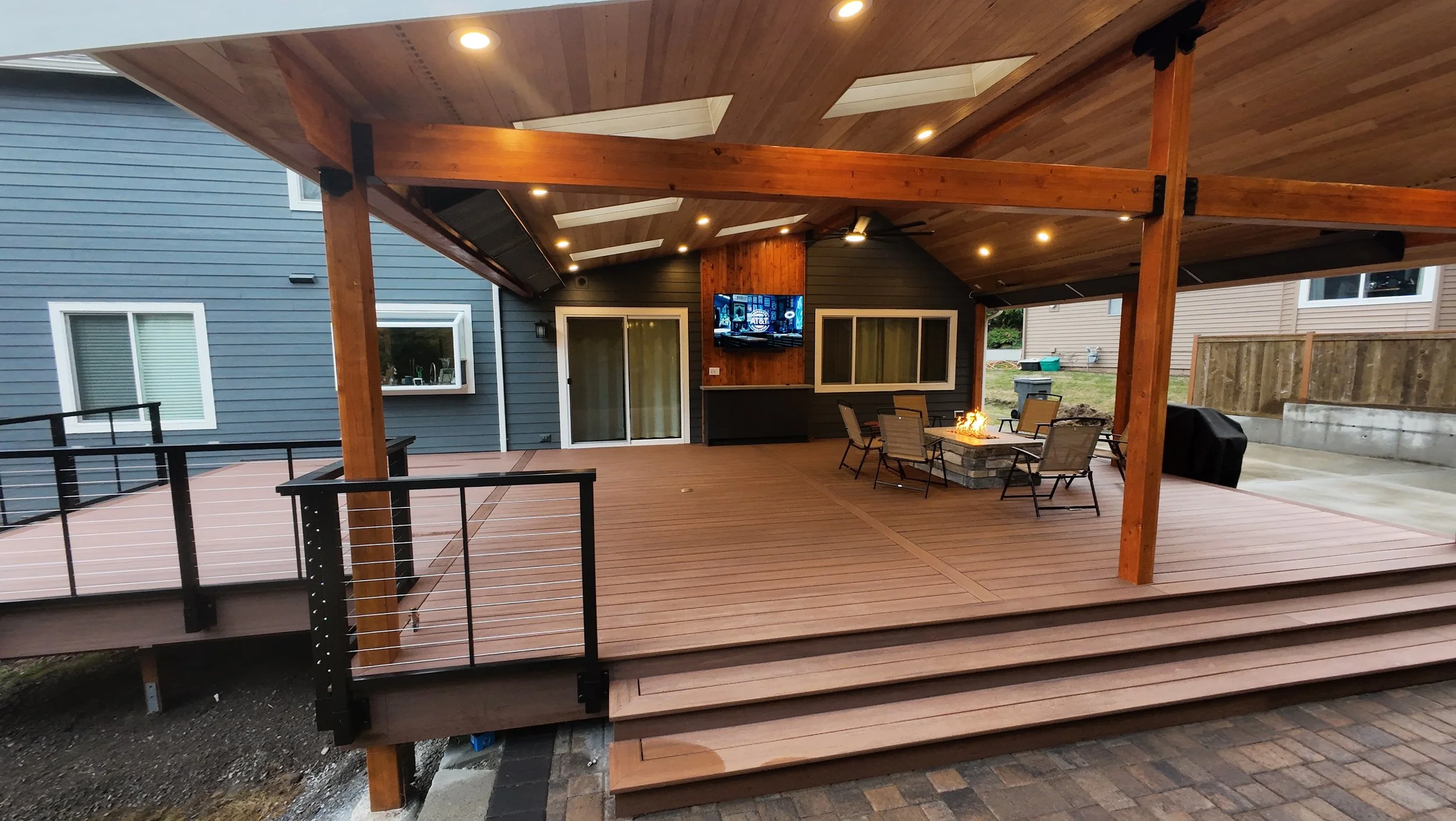New deck and cover with railing, firepit, tv wall, soffits