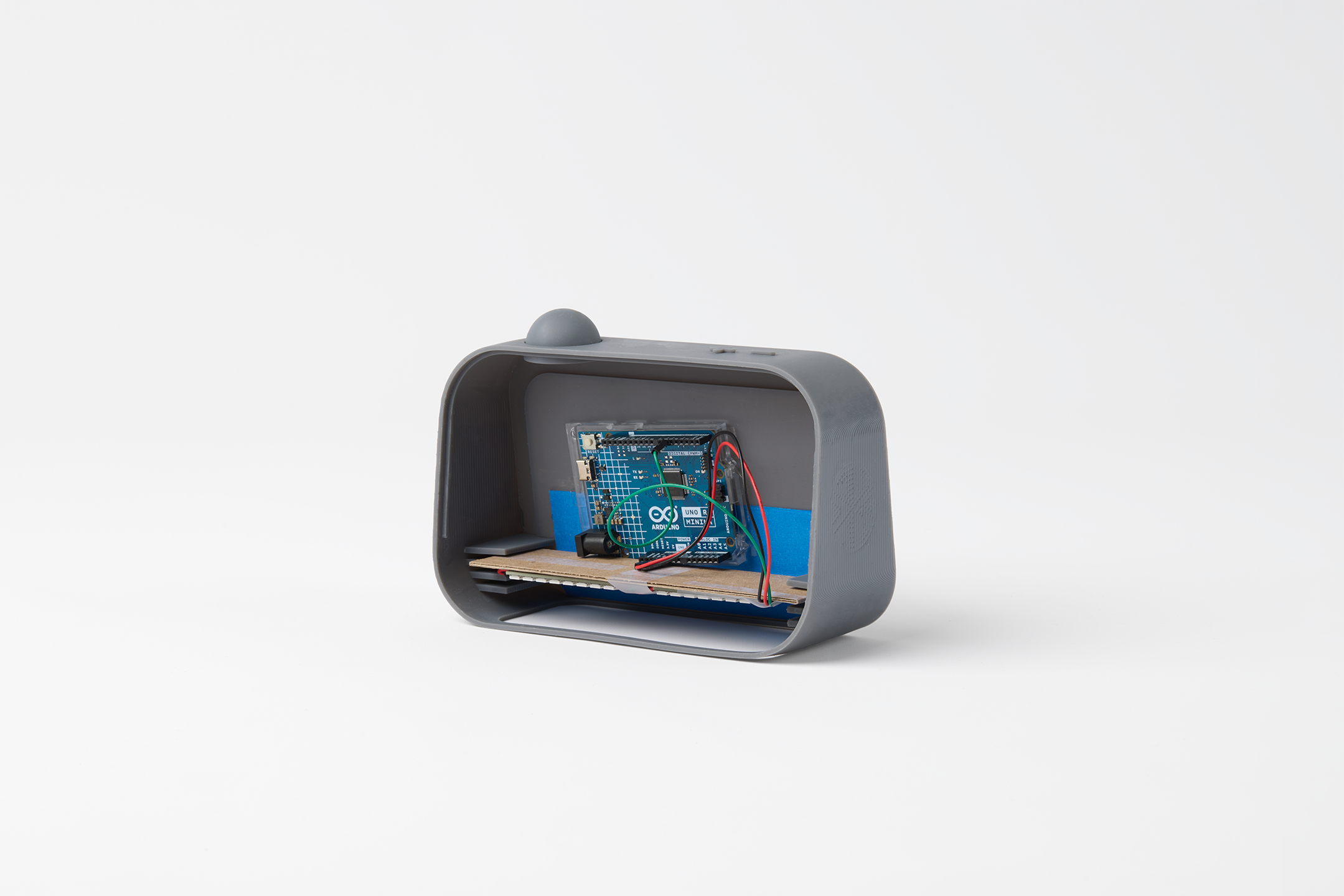 3D print prototype with electronics inside of a children's task tracking device