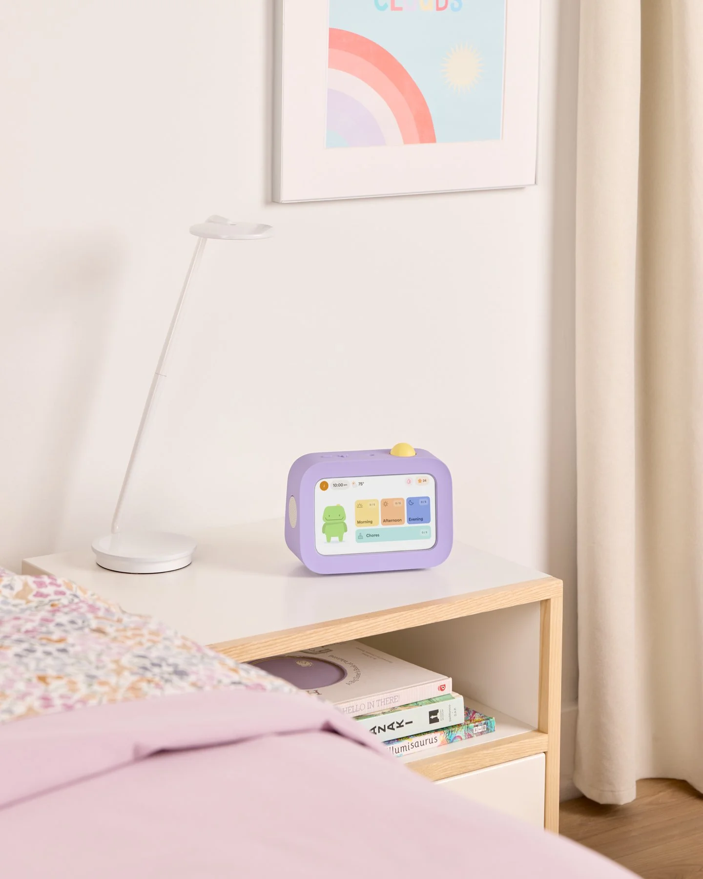 Purple task tracking device called Skylight Buddy shown in a children's bedroom on a nightstand