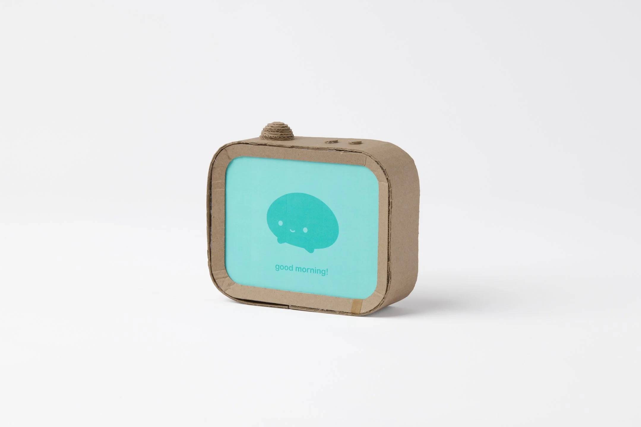 small cardboard prototype of a children's task tracking device