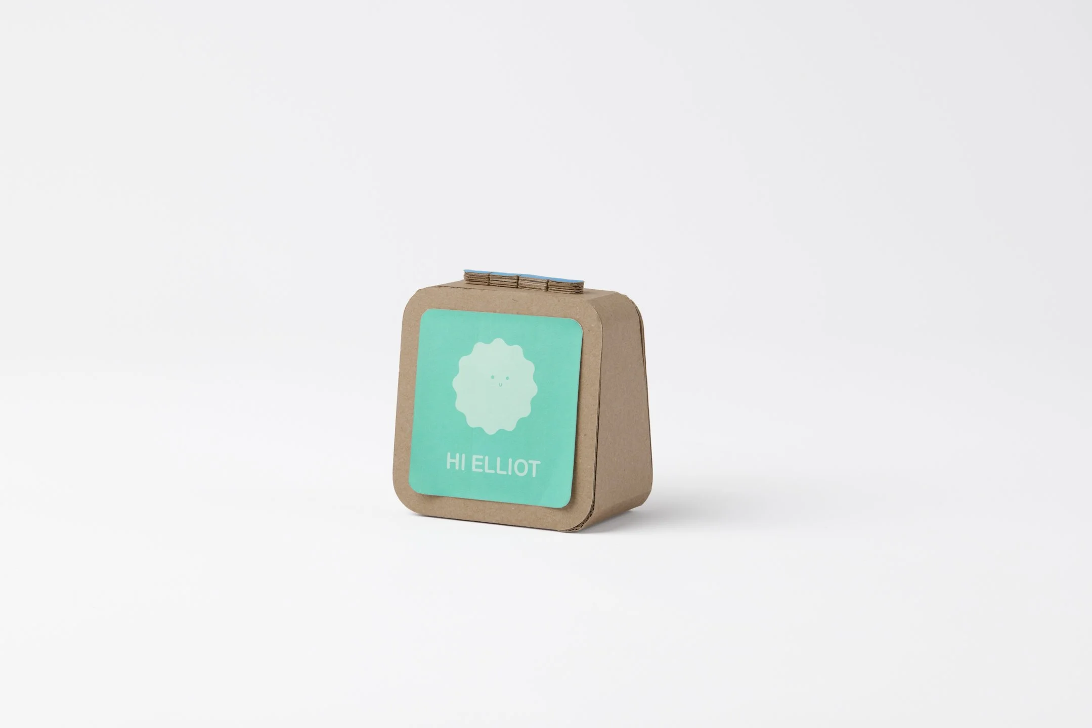 small cardboard prototype of a children's task tracking device