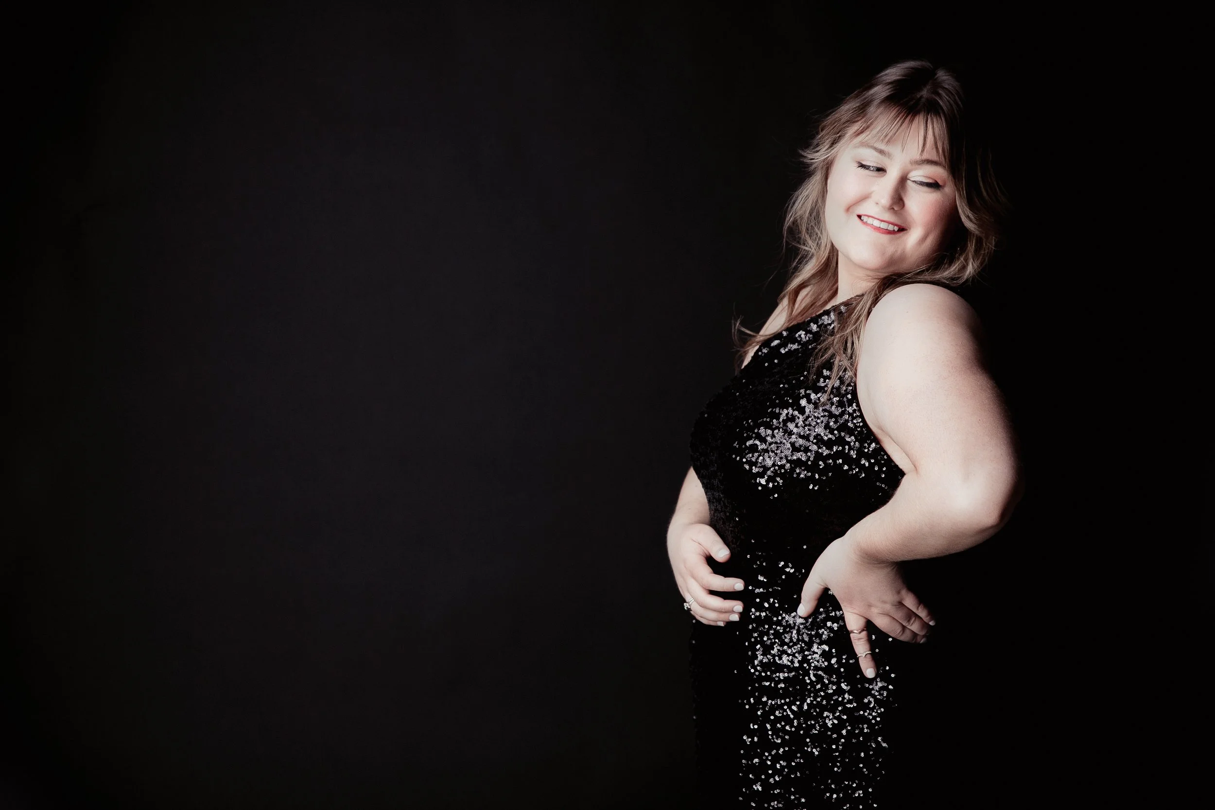 Black Sequin Look Away 2022 Headshot.JPG