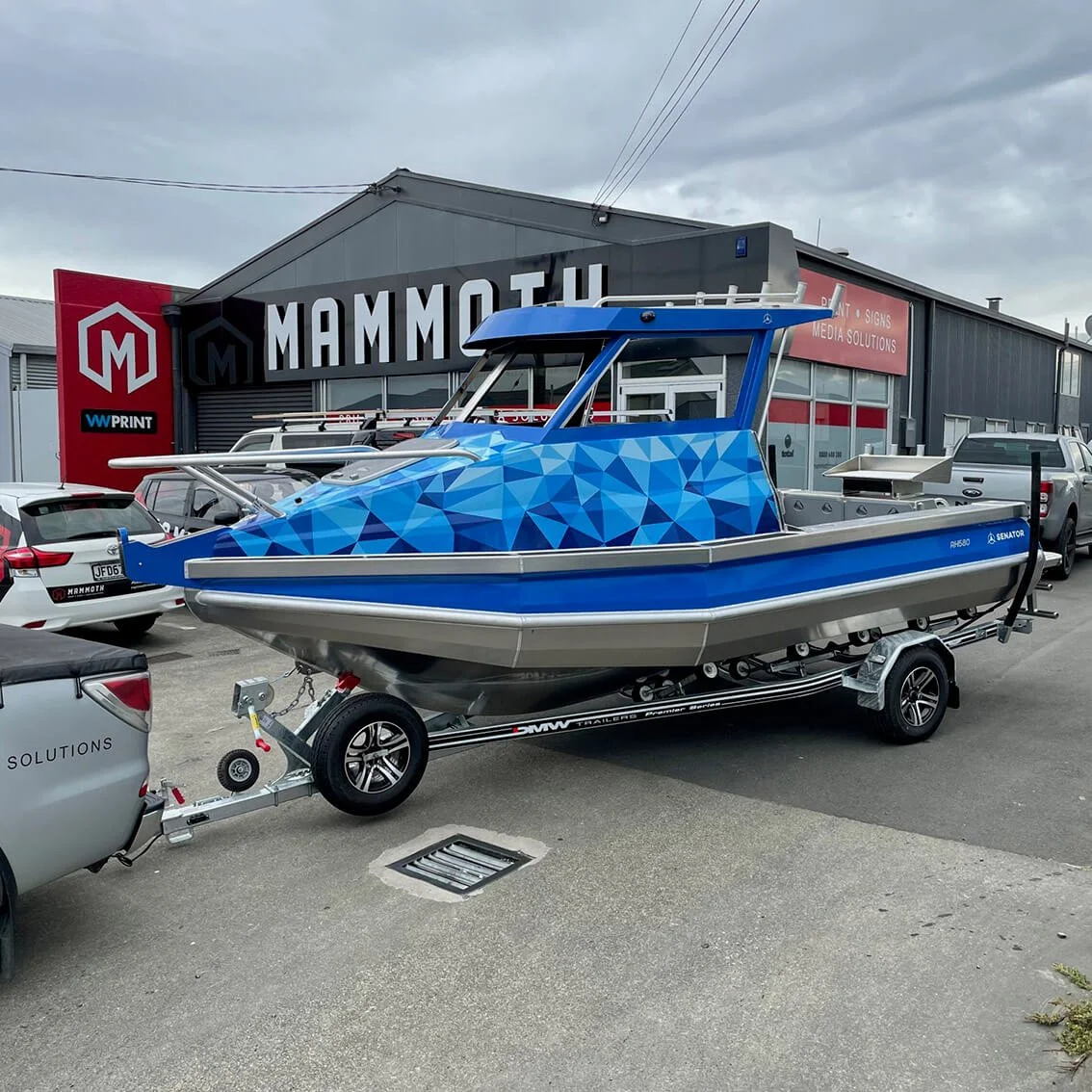 Mammoth Media, Custom boat wrap with blue geometric design, Vehicle & Boat Wraps, Napier New Zealand.jpg
