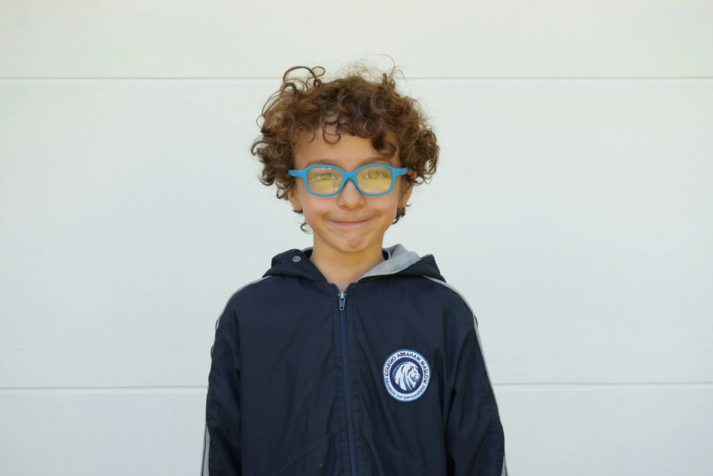Student in uniform carried book