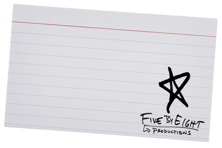 A blank lined index card with a black star logo, the text 'Five By Eight Productions' underneath, and a small arrow pointing right.