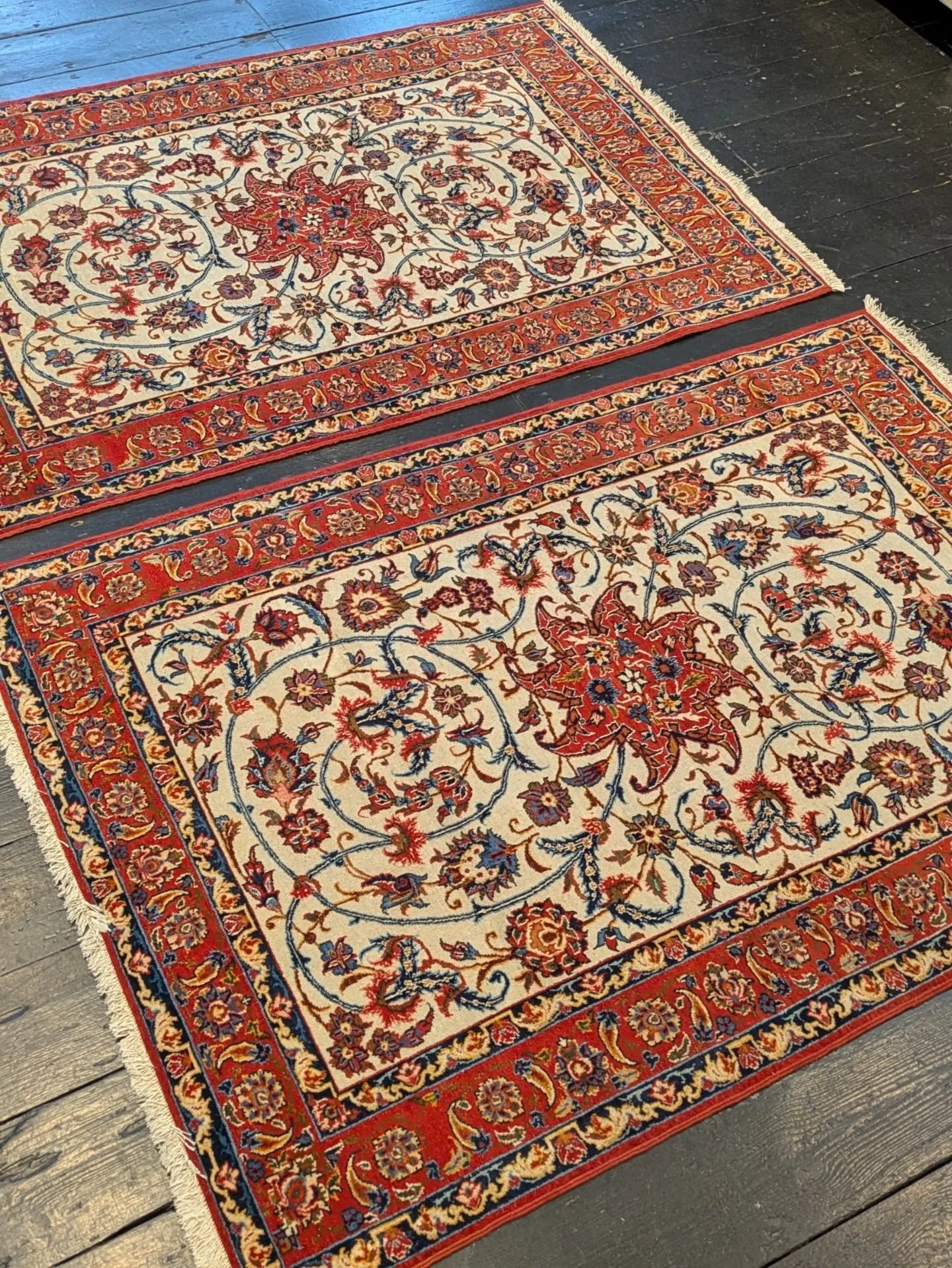 ~AVAILABLE~

Pair of Antique Persian Isfahan Rugs.

Extremely Rare in pattern, tightly woven on ivory background. 

Sizes: 150cm by 105cm
  147cm by 105cm

Professionally washed 

Delivery 🚚 &amp; postage are available 
Or collection from our Galler