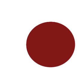 A red circular object on a light-colored surface with a notebook and pens nearby.
