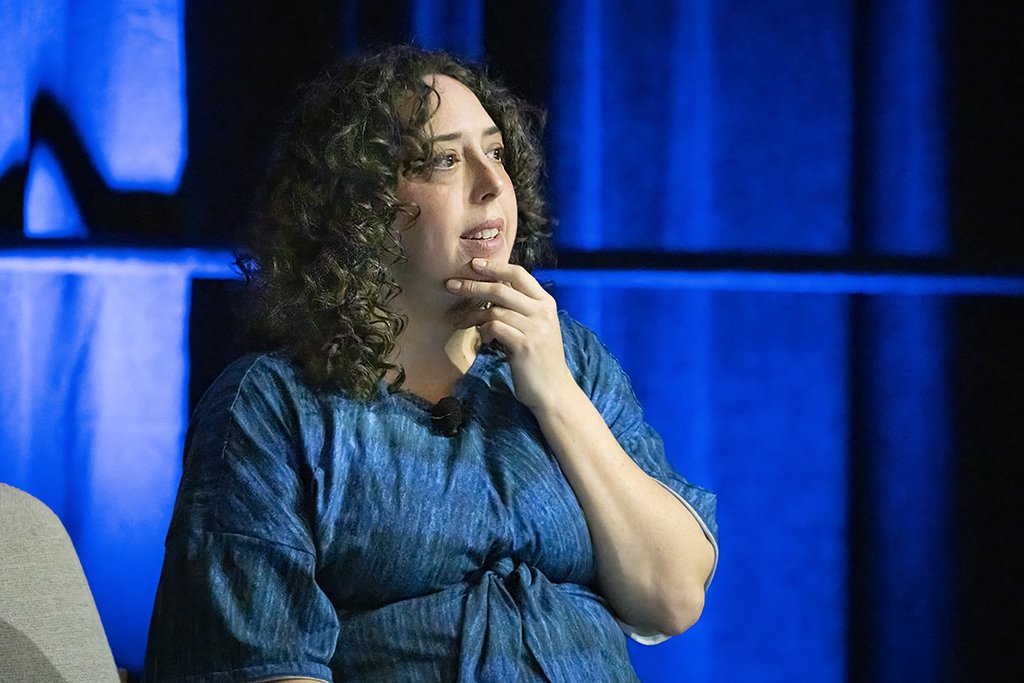Photograph of Shoshana Walter speaking at the Tuerk Conference in Baltimore in 2026.