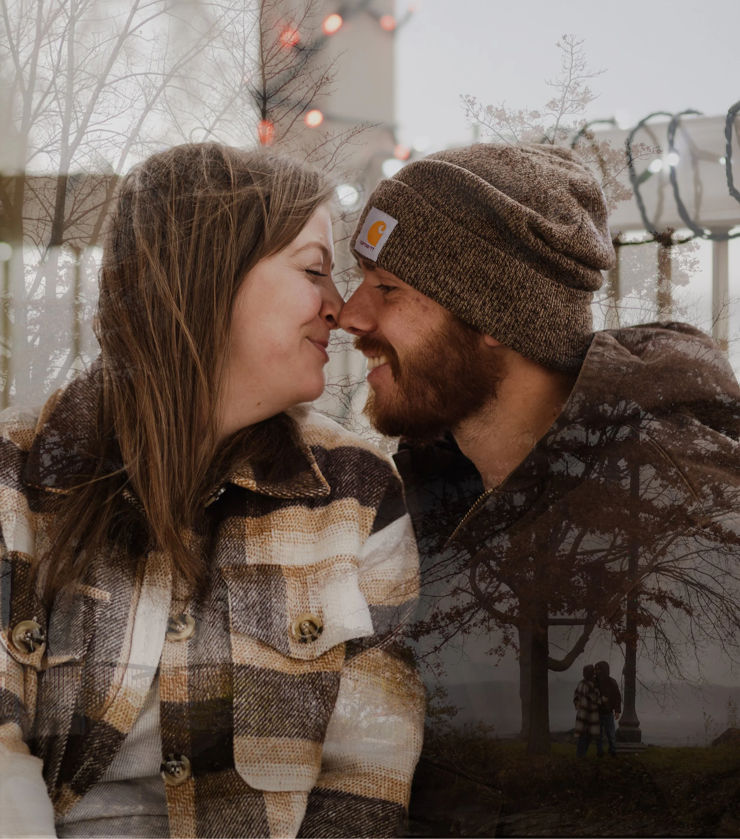 A young couple touching foreheads and smiling, with a double exposure of trees and a park scene in the background.