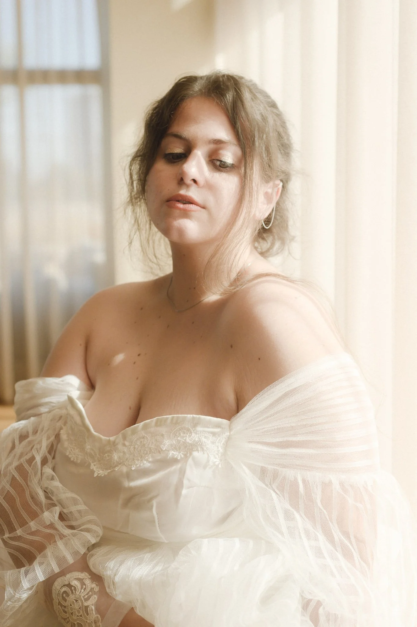 etheral bridal portrait photography of plus size woman wear strapless wedding dress