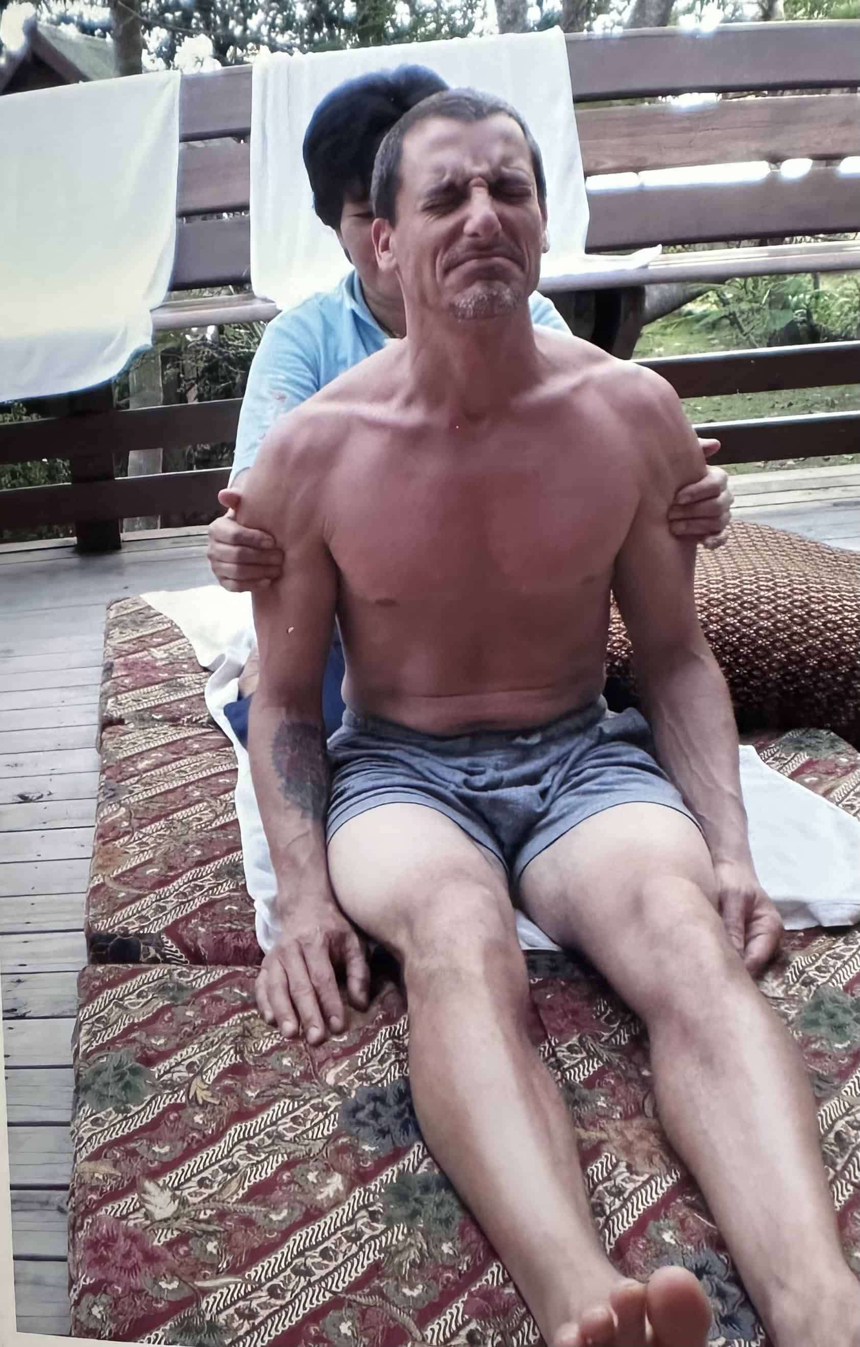 Suffering through a Thai massage while on an epic honeymoon style trip to Thailand.