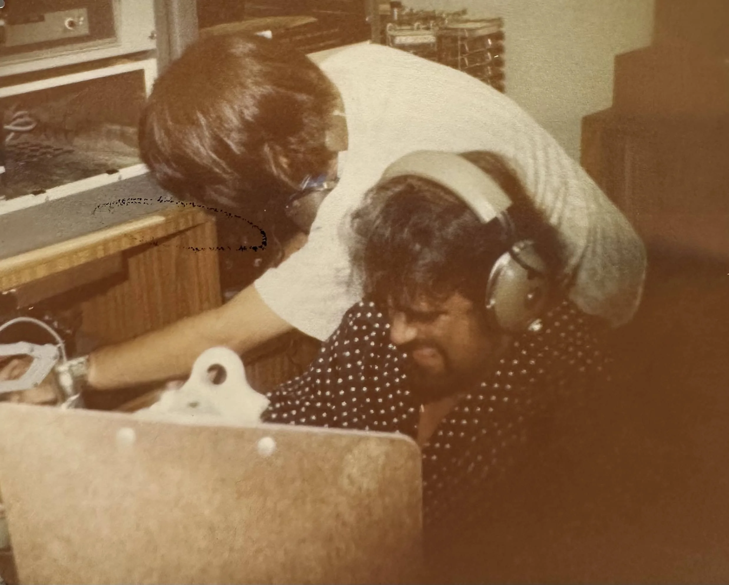 Sexual predator Robert John, the Program Director and the one photo I got of Wolfman Jack doing the radio show live on KROI FM in the late 1970s.