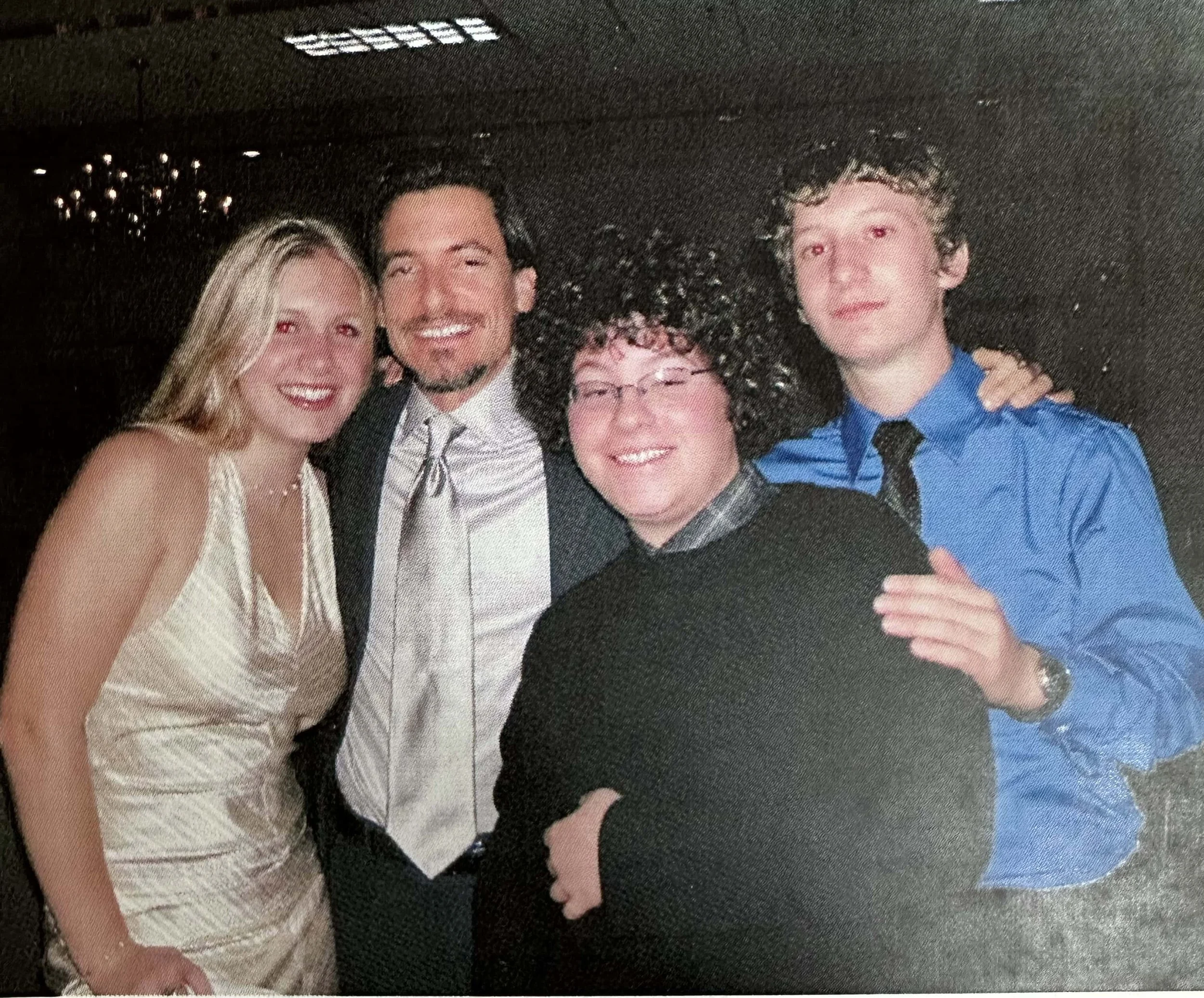 Here I am with my niece and nephews at a family function. They mean the world to me.