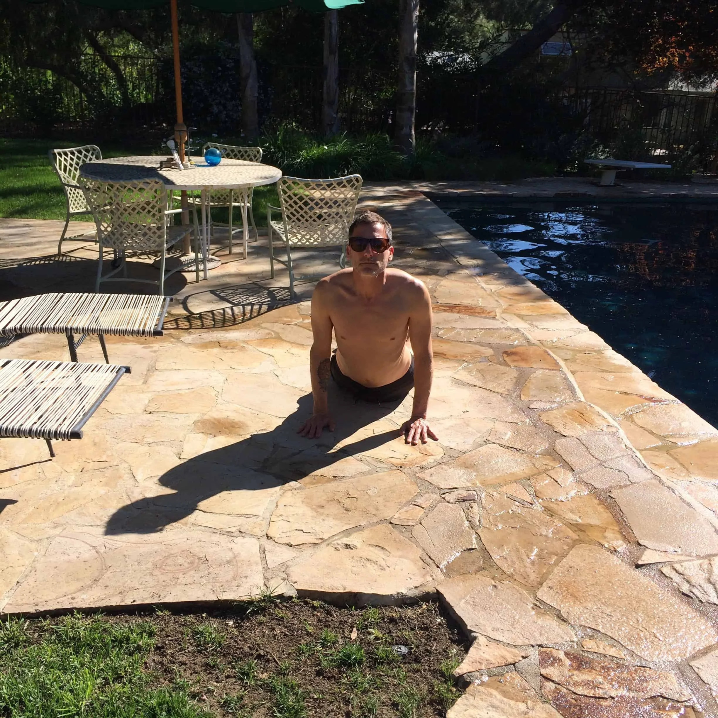 Circa 2016 practicing yoga poolside in Topanga.