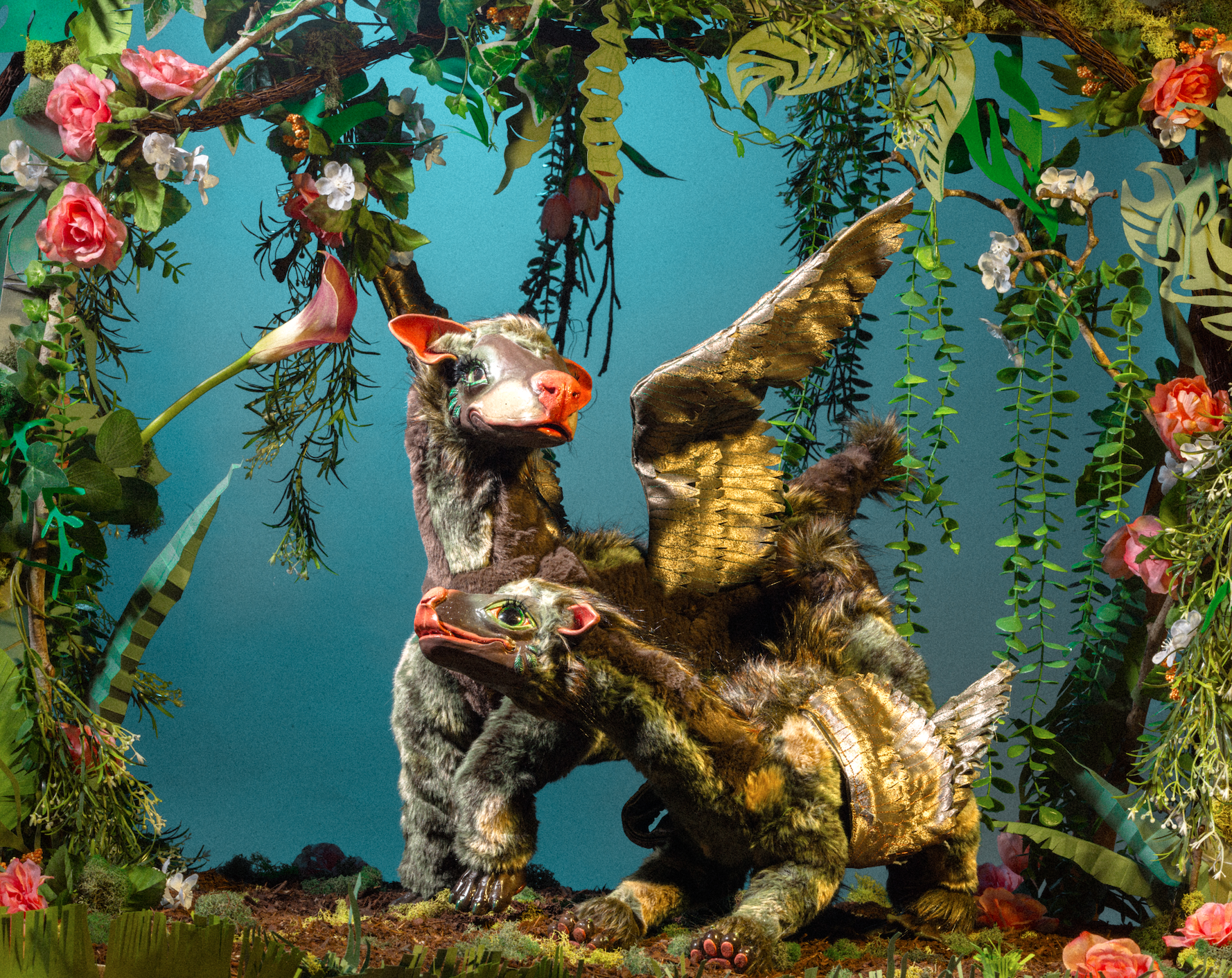 The larger creature is named "Cwtch", the Welsh word for a hug that makes you feel safe and loved. The smaller is called "Hearth" as in the center of the home.