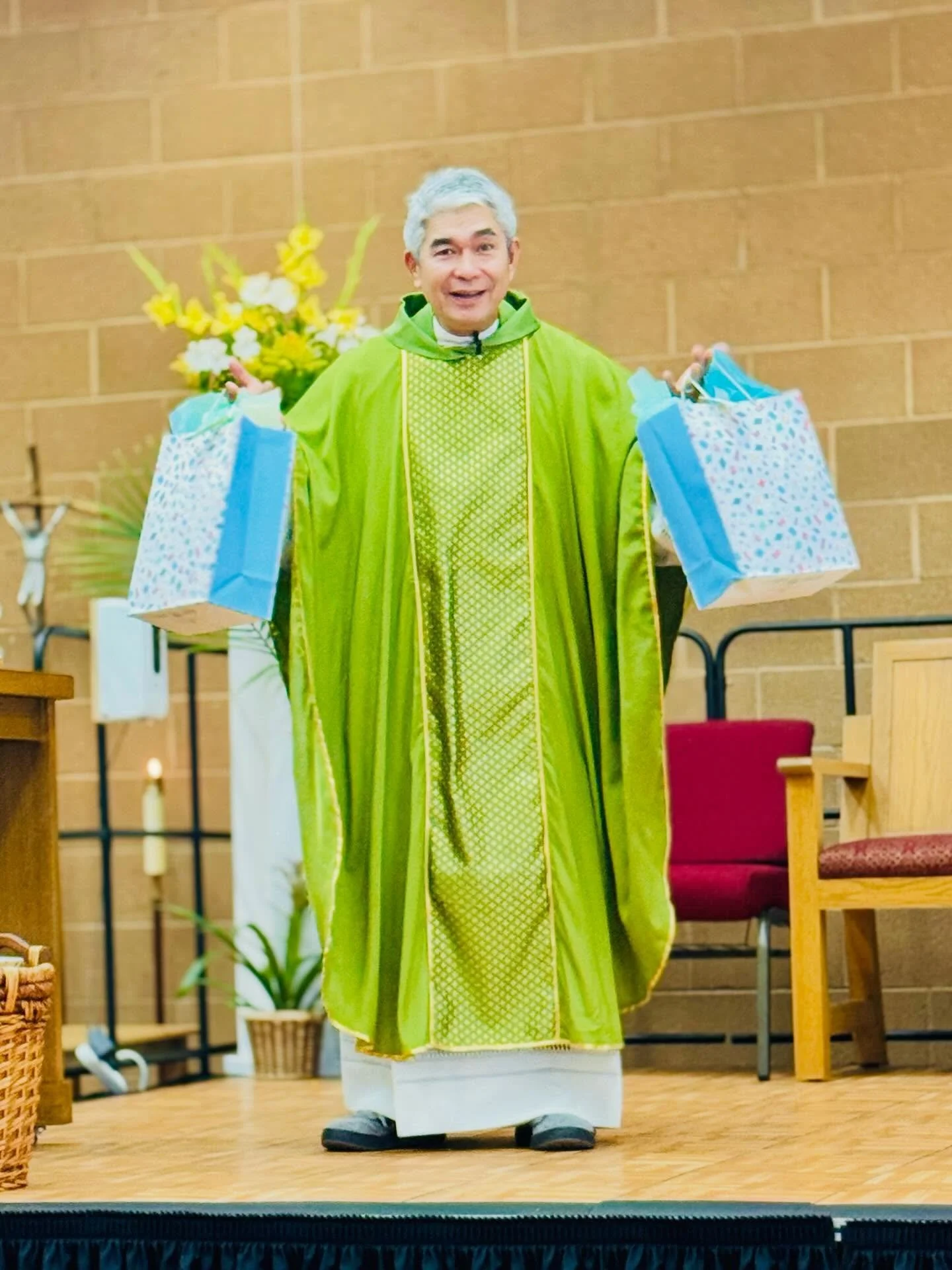 Today we celebrated Father Ariel for Priest Appreciation! 💚💛 Our students and staff presented him with a special gift, led by Dr. Borzych and our Student Council president. We are so grateful for all that Father Ariel does for our school and parish