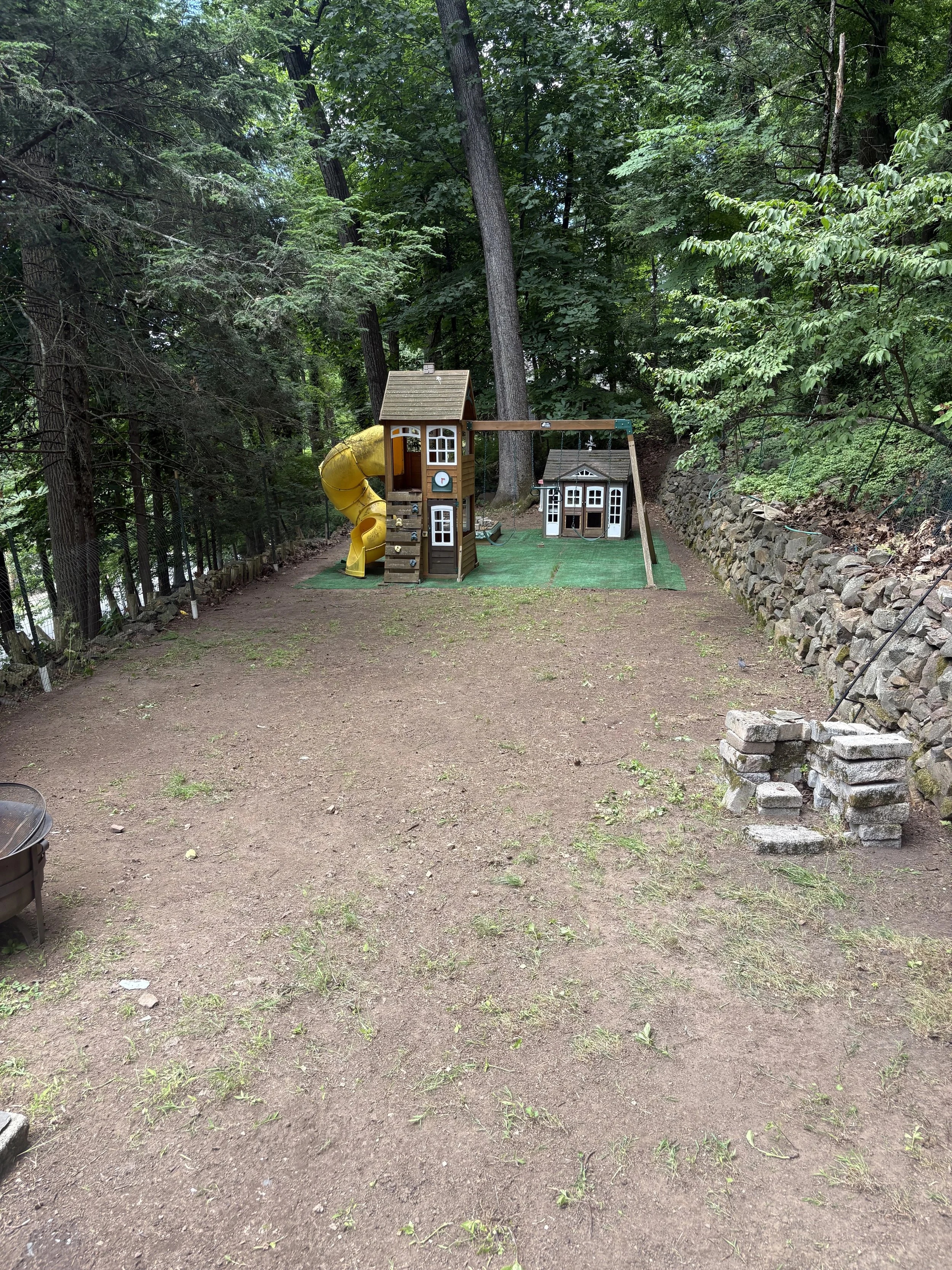 Complete after picture. Now this space is ready for children to play in, it is safe, everything is accessible. Now they are ready for sod. Work done in Upper Montclair, NJ.
