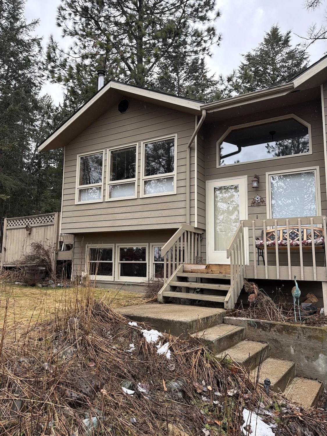 Exterior Kalispell Montana home before repaint