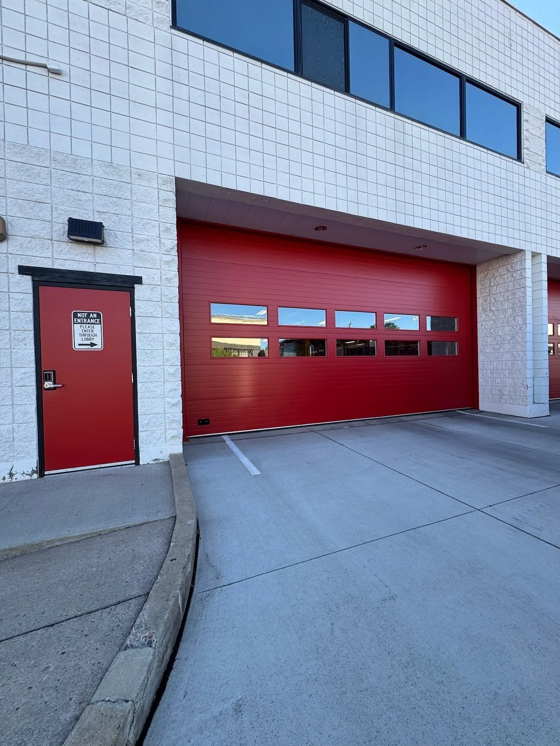 Kalispell Fire Department Repaint Red Garage Doors