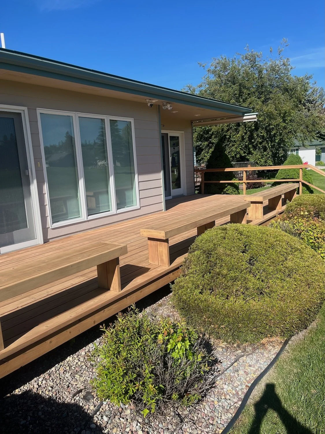 before image of unstained wooden deck exposing raw wood