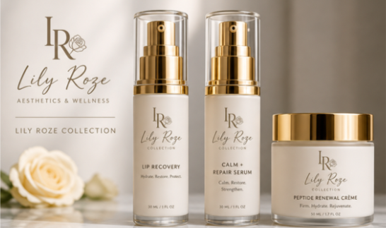 Three Lily Roze skincare products with gold and white packaging, including Lip Recovery, Calm + Repair Serum, and Peptide Renewal Creme, arranged on a surface with a blurred background.