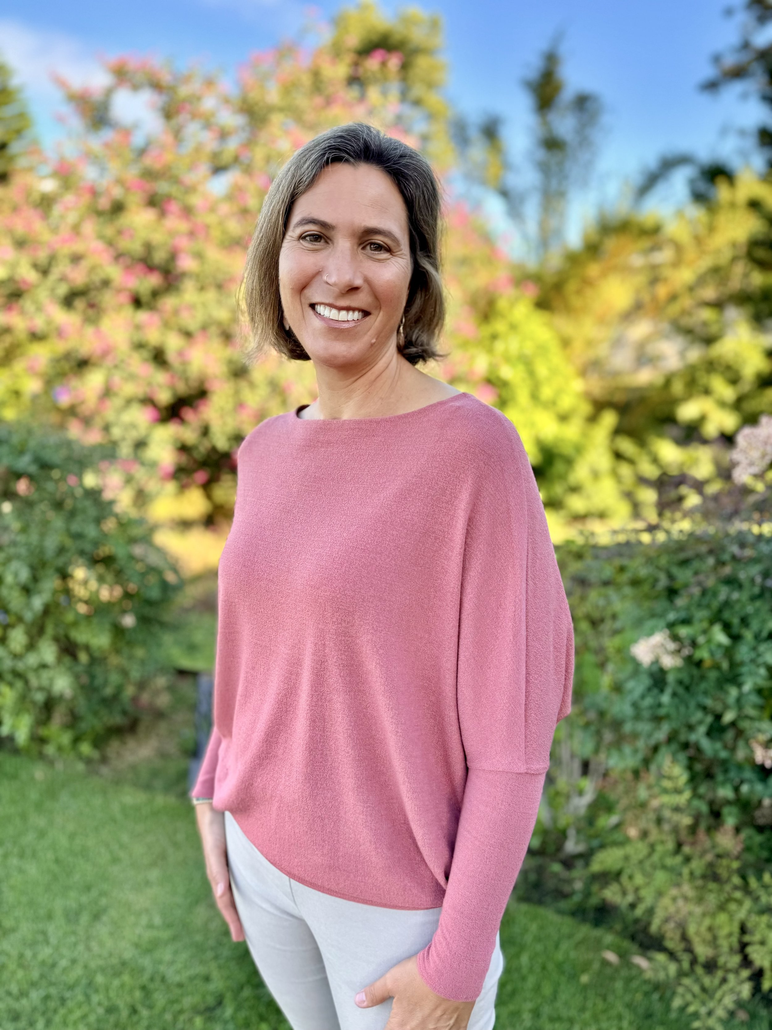 photo of Janine Cuthbertson in her garden on Maui