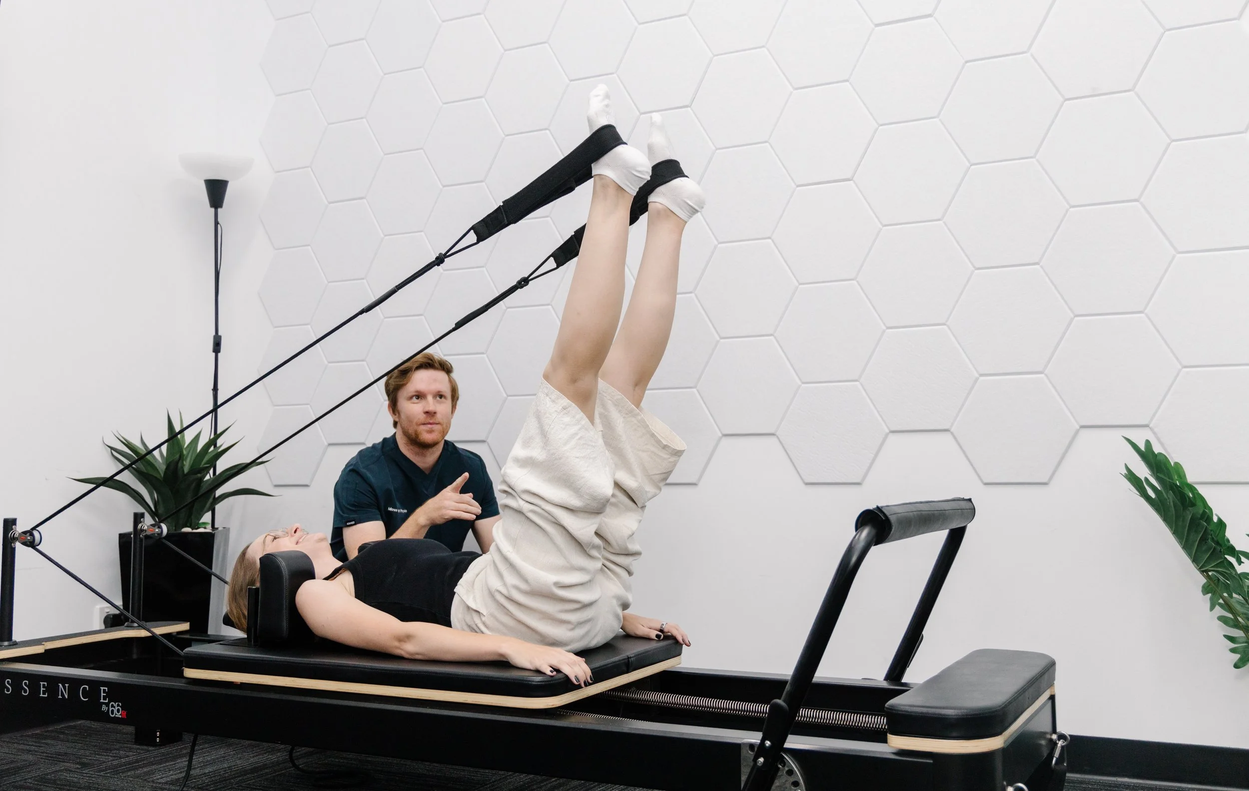 Physiotherapist guiding a patient through post-operative rehabilitation exercise at Move Right Physio Dakabin