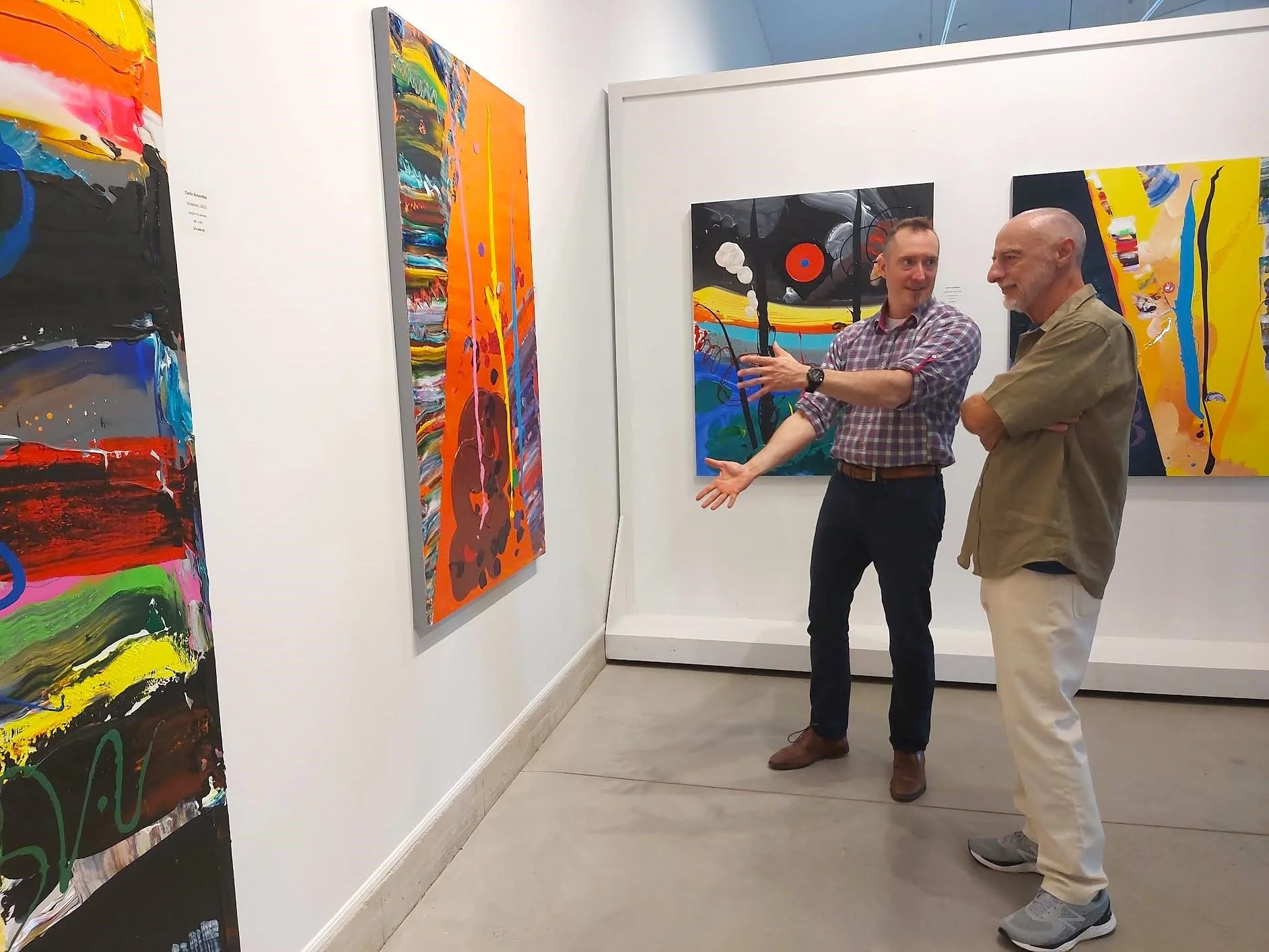 Paige Armstrong of Armstrong Fine Art Consulting with Canadian artist Carlo Amantea, exhibition at the John Mann Gallery