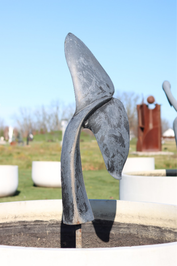 Large stone Springstone sculpture by Zimbabwe Canadian sculptor Chaka Chikodzi