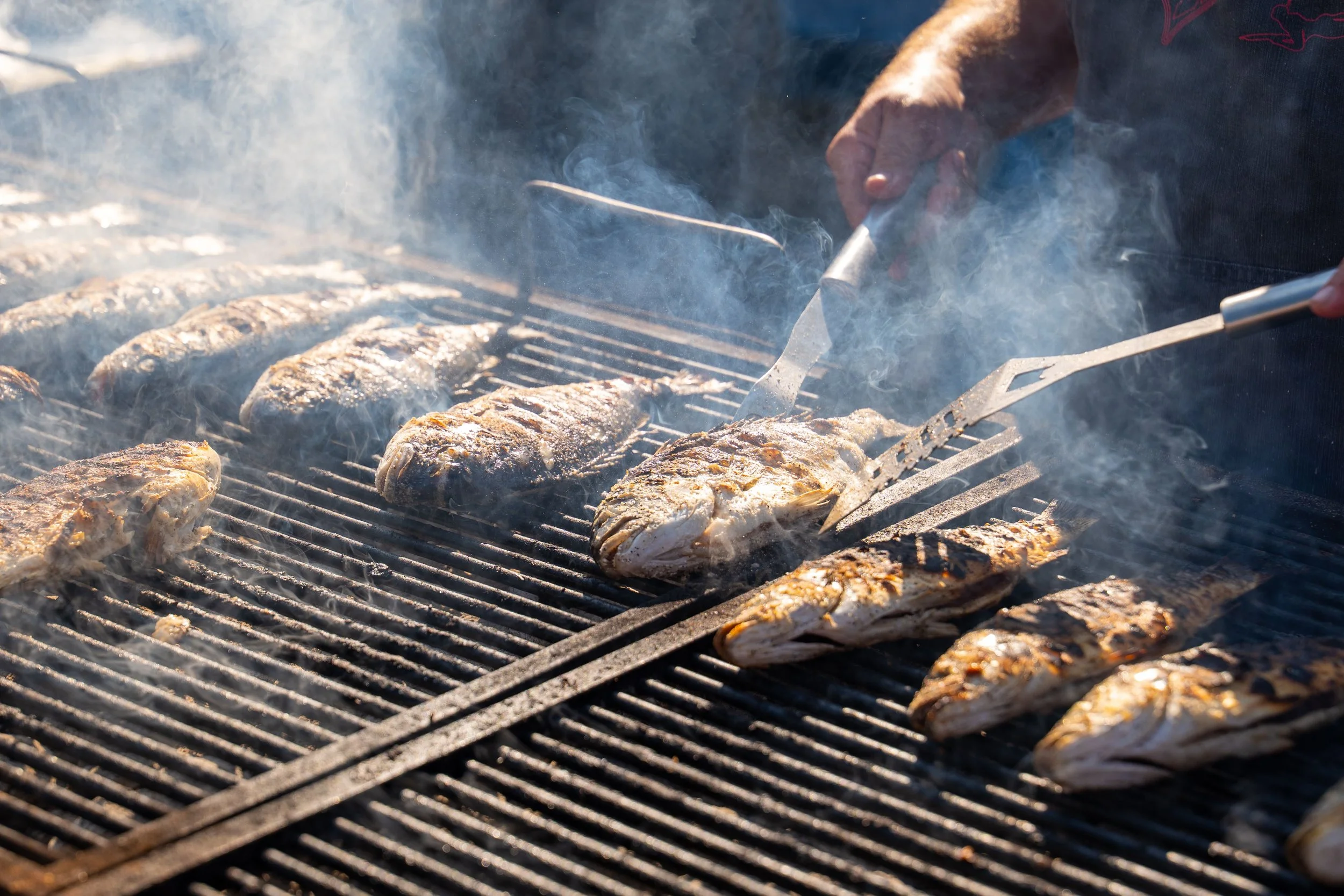 Fresh food being grilled during the Pink Beach island tour