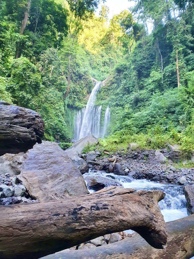 Sendang Gile Waterfall surrounded by lush rainforest in North Lombok