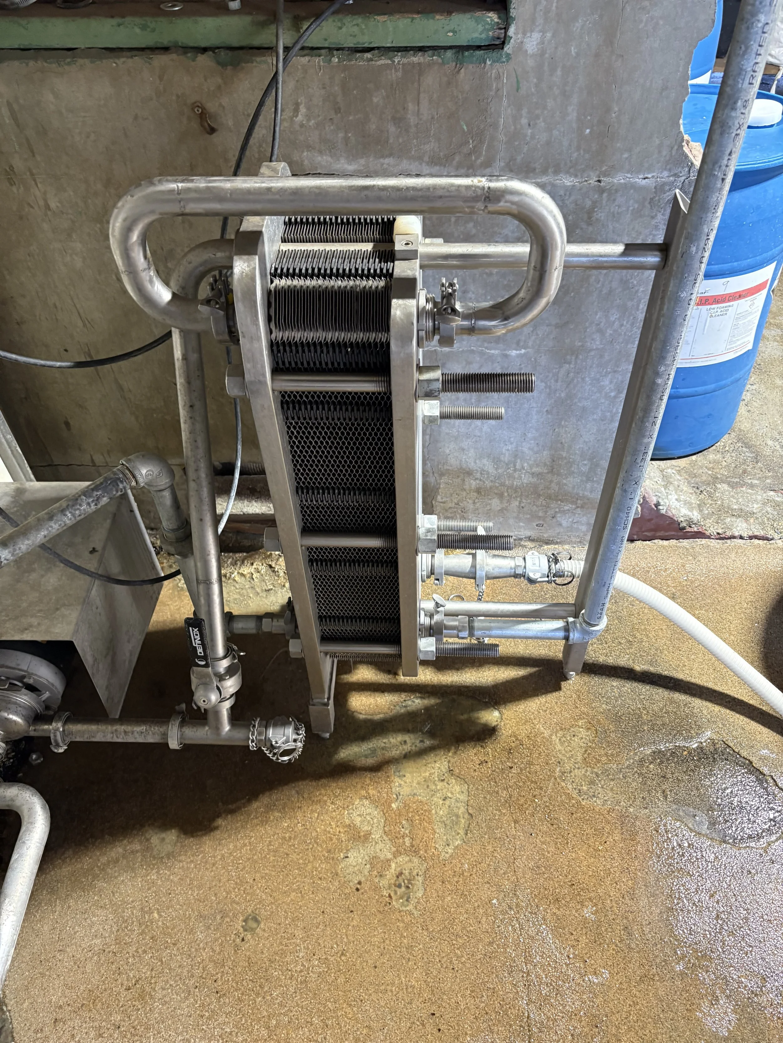 Custom-sourced and plumbed this like-new heat exchanger, delivering excellent value and reliability