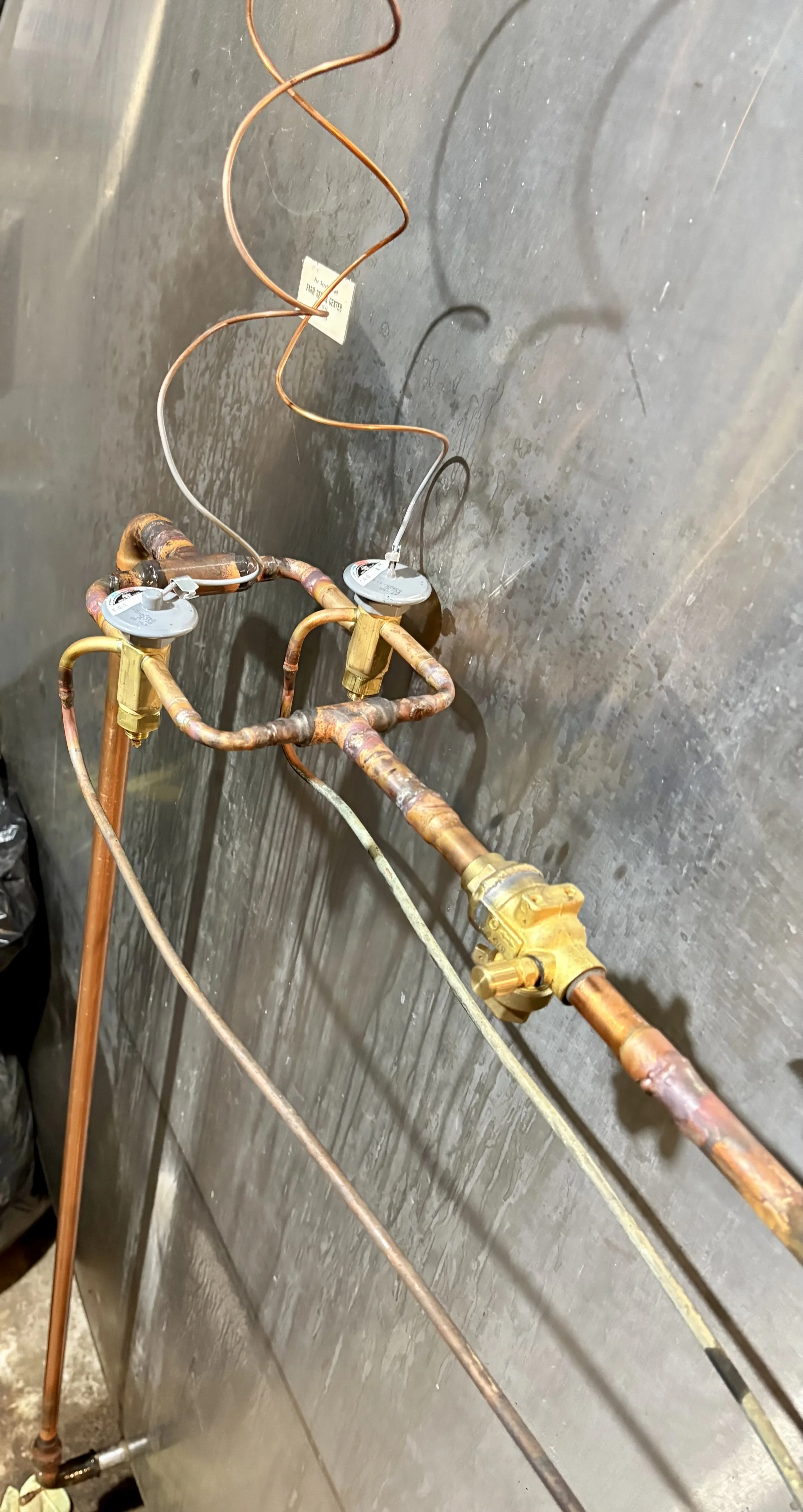 "Can't be done" doesn't stop us. We installed dual TXVs to retrofit a half-century old cooling system that failed, keeping a critical operation running - no full replacement required. 3 months in, still running strong. Innovative solutions. Zero shor