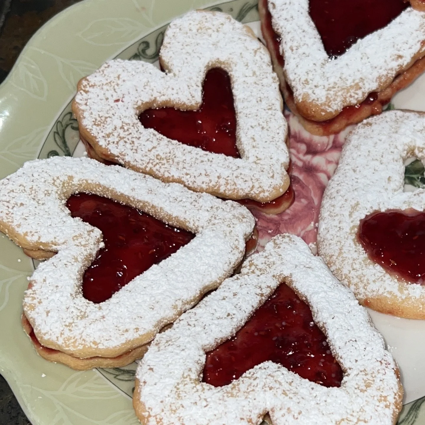 heart raspberry jam sugar cookies, specially available for valentine&rsquo;s day 🤍🩷

i will be having a limited quantity of these heart raspberry jam sugar cookies available for tomorrow! 

a dozen (12 count) for $26.25, half a dozen (6 count) for 