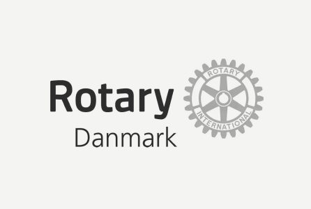 Rotary Denmark logo featuring the Rotary wheel emblem and text.