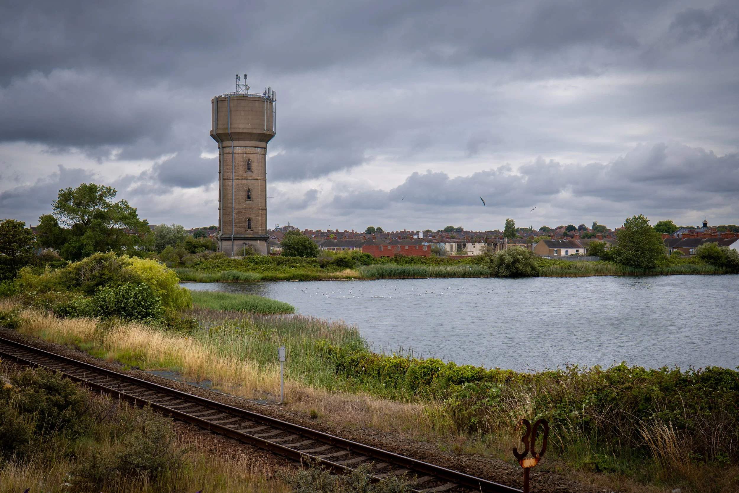 Cleethorpes Water Tower on Chapman's Pond. The tower is allegedly haunted, and the lagoon bottomless. Lincolnshire.