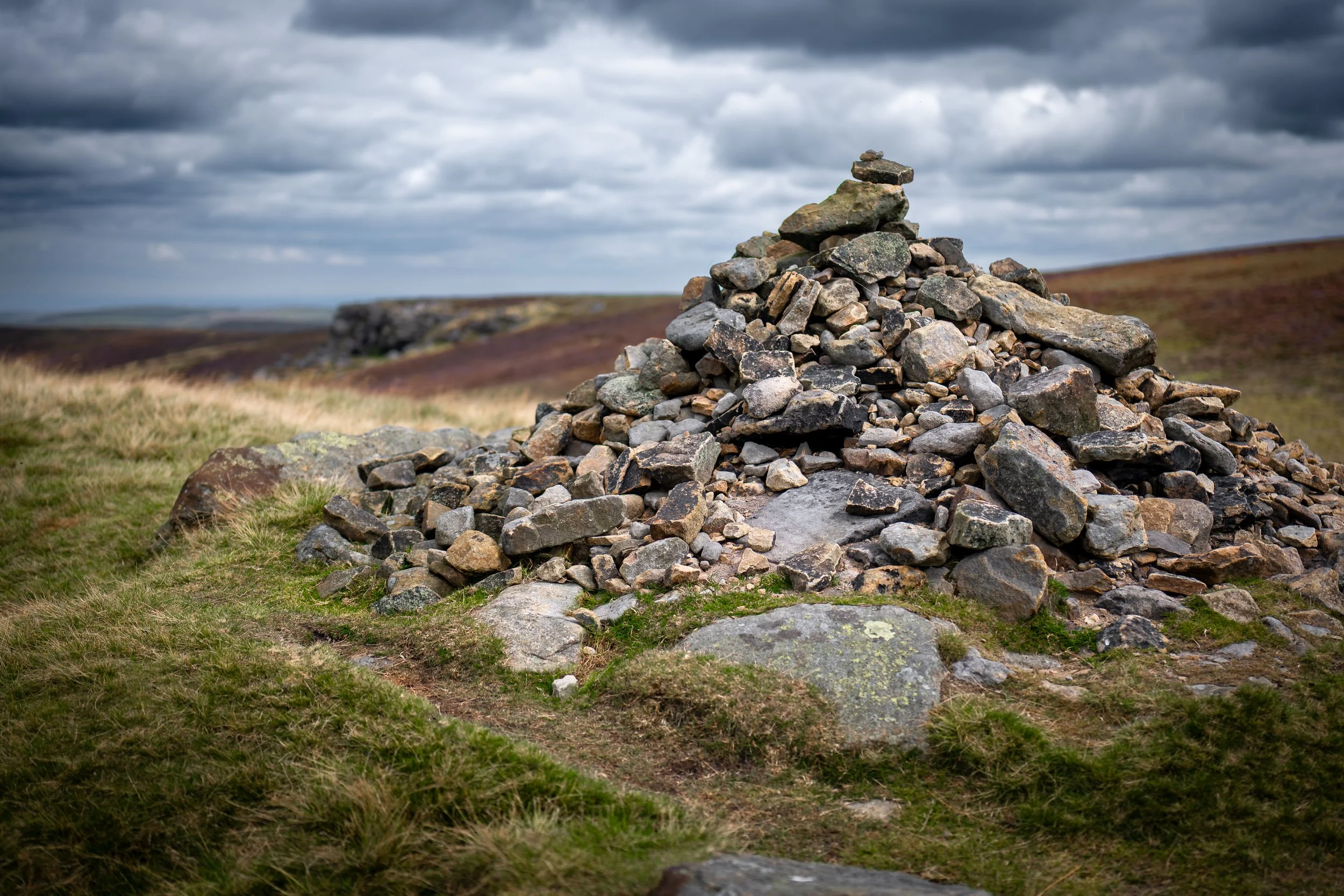 The Lost Lad cairn commemorating Abraham Lowe, a 13 year-old shepherd boy who became disorientated and froze to death in a blizzard (and whose ghost haunts the site). Derwent Edge, Derbyshire.