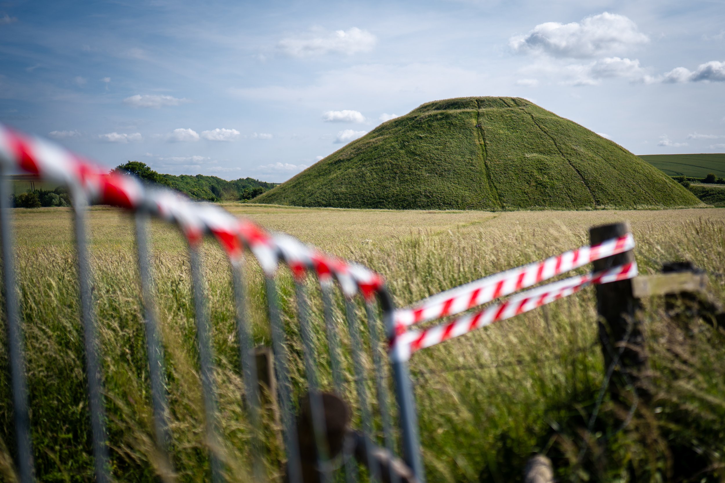 Silbury Hill, the largest prehistoric man-made mound in Europe, and said to have been created by the devil dropping a bag of soil. Avebury, Wiltshire.