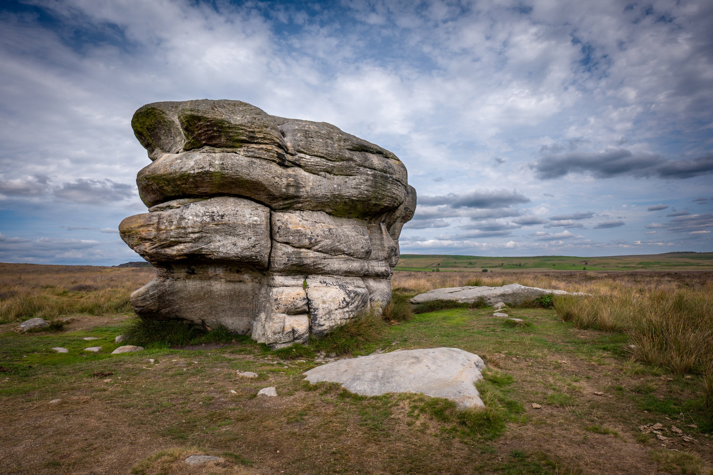 The Eagle Stone, aka the Witch's Stone, the Peak District's largest gritstone boulder, where (inter alia) evil spirits are said to hunt the souls of the dead. Baslow Edge, Derbyshire.