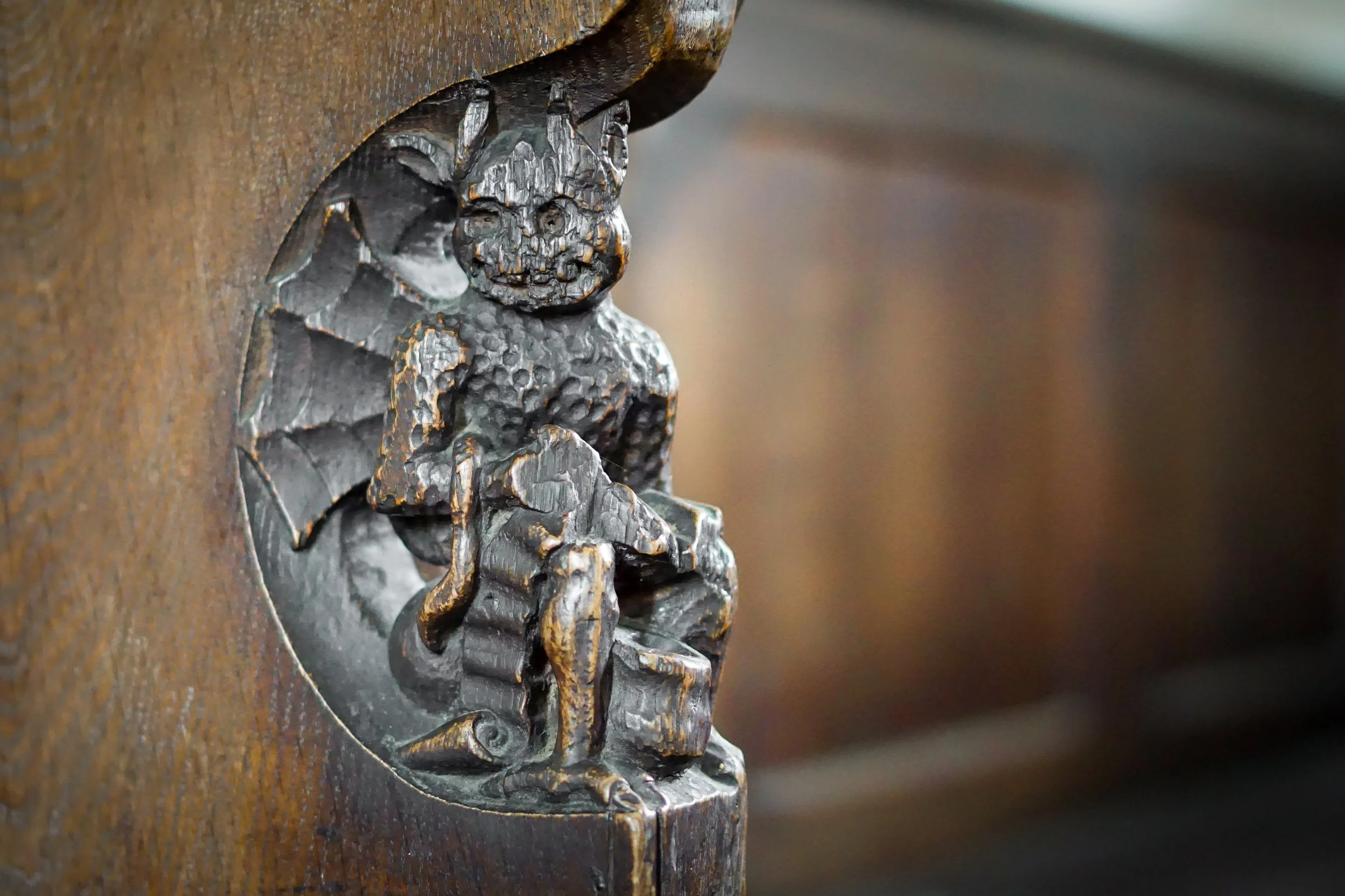 Devil plucking a goose. St Andrew, Holme Hale, Norfolk.